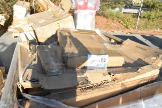 Seven brand new scratch and dent items in opened boxes, including floor mat, trash can lid, and flatware rack. Auction lot labeled "OCT25-62."