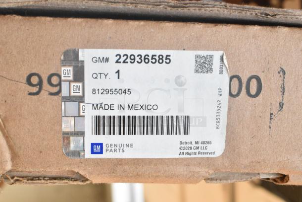 Box with GM 22936585 label. Includes cargo area security enclosure. Made in Mexico, GM Genuine Parts.