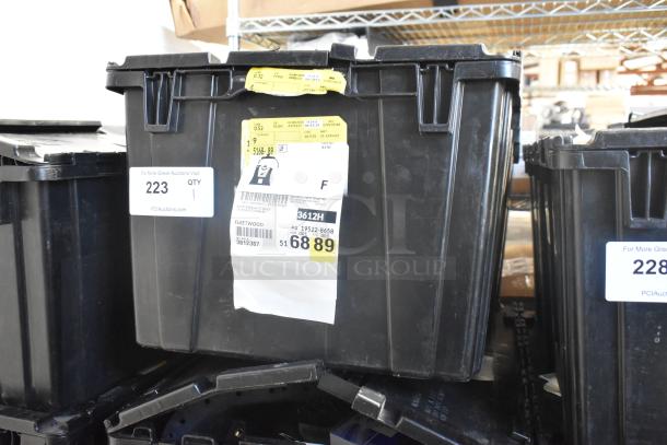 Black poly bin containing brand new GM Chevy Camaro front driver side marker lamp (92246245) with visible shipping labels.
