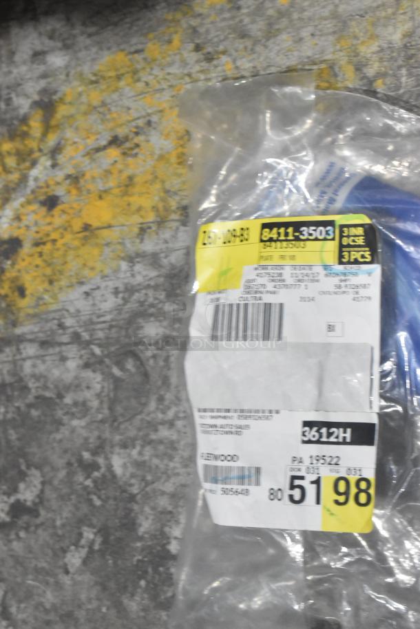 Lot of various car parts, including a GM Chevy Camaro front driver side marker lamp (92246245) in a black poly bin. Tags visible.