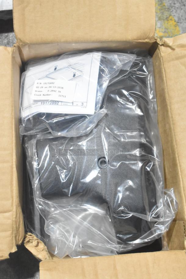 Brand new car parts lot includes GM 84221510 filets and GM 25790357 ACDelco brake air duct in a black poly bin.