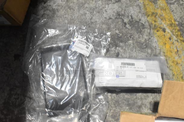 Brand new lot of GM car parts, including ENS Filet 84221510 and ACDelco Brake Air Duct 25790357, in black poly bin.