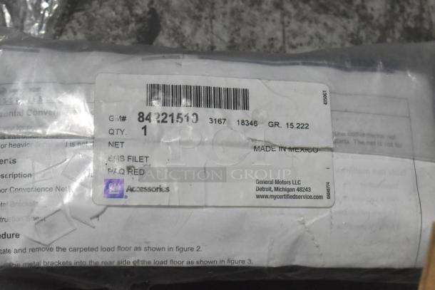 Brand new GM car part GM# 84221510, ENS Filet, sealed with label; in black poly bin, automotive accessory.
