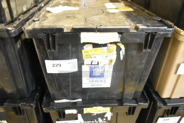 Brand new lot of car parts, including car mats and Hawk Racing disc brake pads, stored in a black poly bin. Labels present.