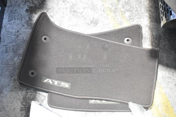 Brand new ATS car mats in black. Includes Hawk Racing disc brake pads in a black poly bin.