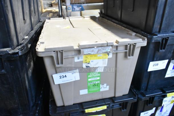 Brand new lot of various car parts, including car mats, in a tan poly bin with multiple labels indicating item details.