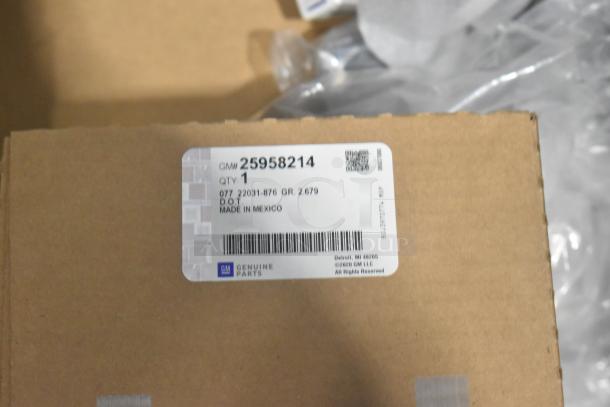 "Brand new GM 25958214 tail lamp assembly box with label indicating genuine parts, quantity: 1, made in Mexico."