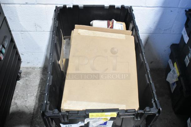 Brand new lot of car parts in black poly bin, includes GM 19166248 roof luggage carrier cross rail attachment kit.