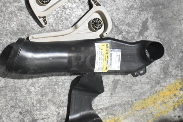 Brand new GM 19166248 roof luggage carrier cross rail attachment kit, black, with label showing part numbers in a poly bin.