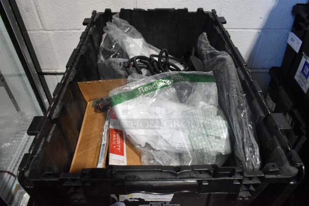 Brand new lot of various car parts, includes GM 84044906 brake deflector, handle, in black poly bin.