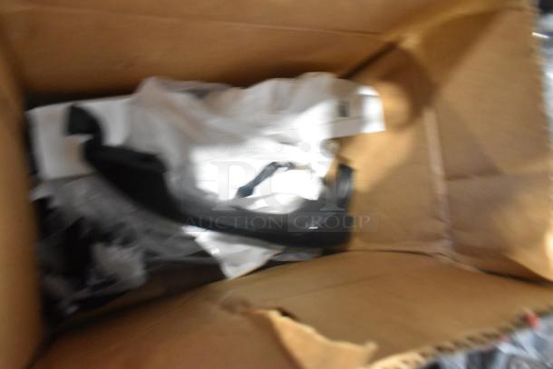 Brand new lot of various car parts in a box, includes GM 84044906 brake deflector and handle, in black poly bin.