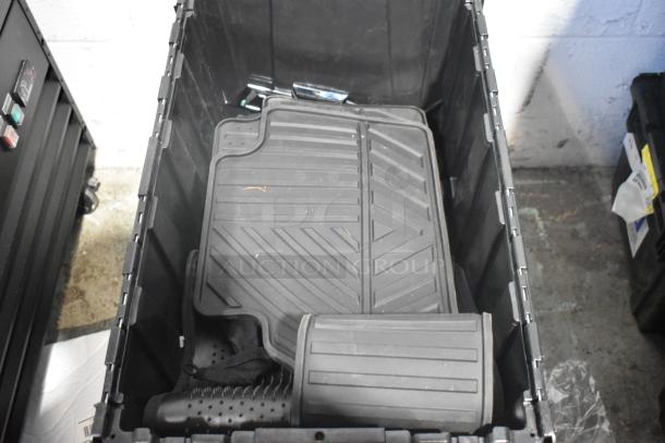 Brand new car parts lot with mats and emblem in black poly bin, excellent condition.