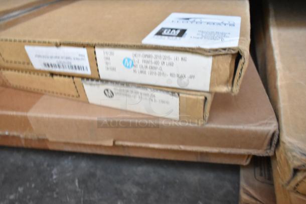 Brand new tier lot of car parts, including car mats. Boxes labeled for 2010-2015 Chevy Camaro mats, ebony color.