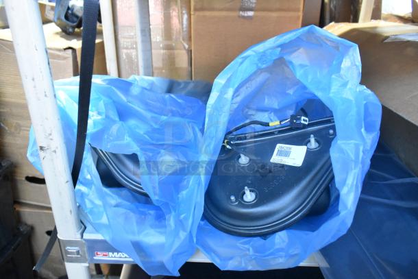 Brand new GM 20862098 mirror assembly, sealed in blue plastic with visible part label, part of assorted car parts lot.