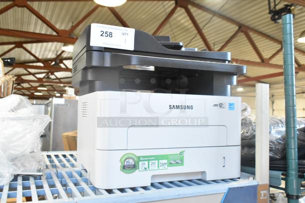 Samsung Xpress M2885FW printer, scanner, copier in good condition. Features BLI award and eco-friendly toner labels.