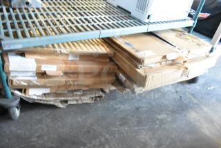 17 brand new car mats in cardboard boxes; visible labels and markings indicate quantity and condition.