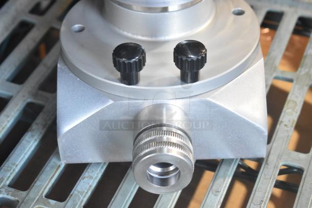 Metal hopper with two black knobs, sturdy design, and precision-engineered nozzle. Suitable for industrial use, excellent condition.