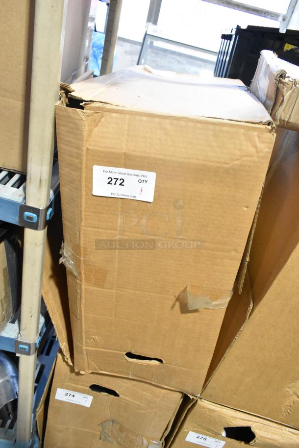 Cardboard box labeled "272" containing brand new rims. Box shows signs of wear.