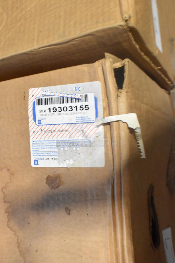 Box of 2 brand new GM 19303155 rims. Original packaging with GM label, indicating genuine parts.