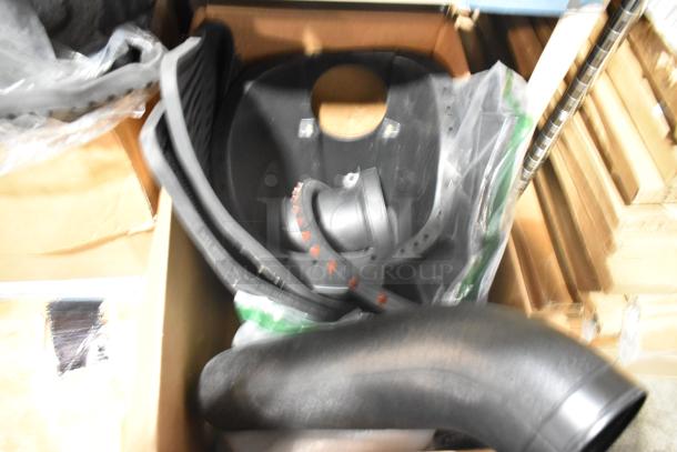 Brand new tier lot containing various automotive items, including black car mats, in original packaging.