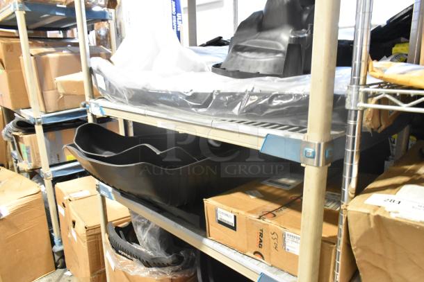 Two-tier shelf with GM 22858823 car mats and GM 84449319 Chevrolet retractable cargo shade in jet black, brand new.