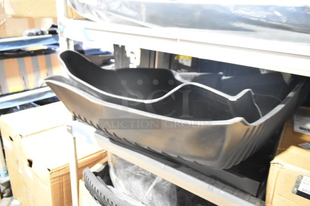 "Two-tier shelf with GM 22858823 car mats and GM 84449319 Chevrolet retractable cargo shade, jet black, brand new."