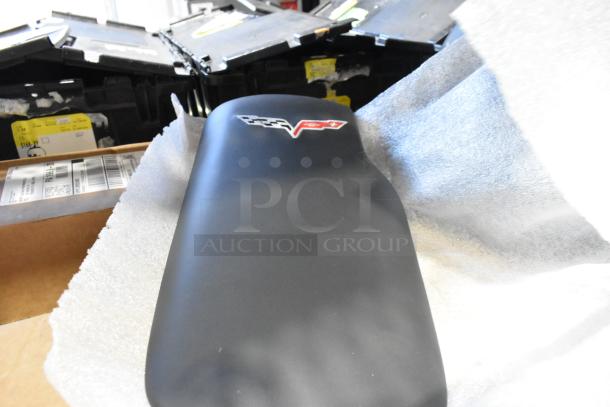 BRAND NEW GM 84449319 Chevrolet cargo shade in jet black, includes logo; features packaging with visible labels.