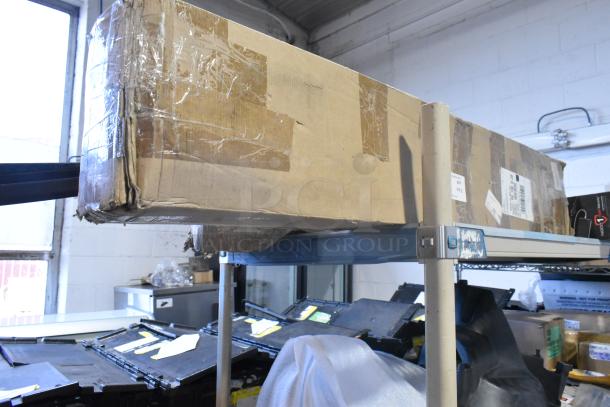 Two brand new 19171186 Footrack Assemblies in sealed cardboard boxes, displayed on a warehouse shelf.