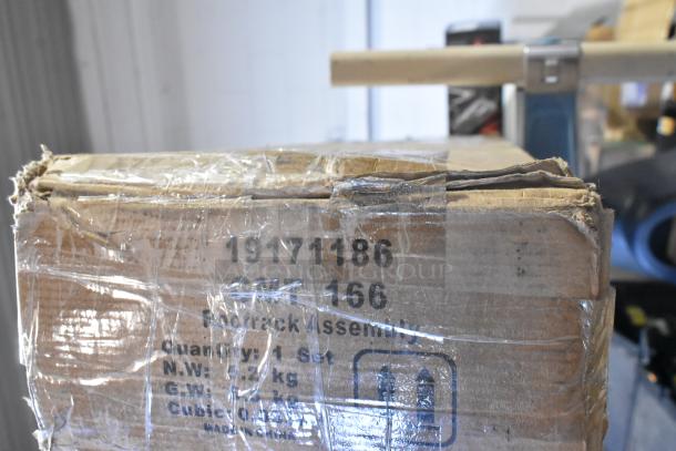 Cardboard box labeled "19171186 Footrack Assembly," wrapped in tape, appears new, contains 1 set, marked "Made in China."