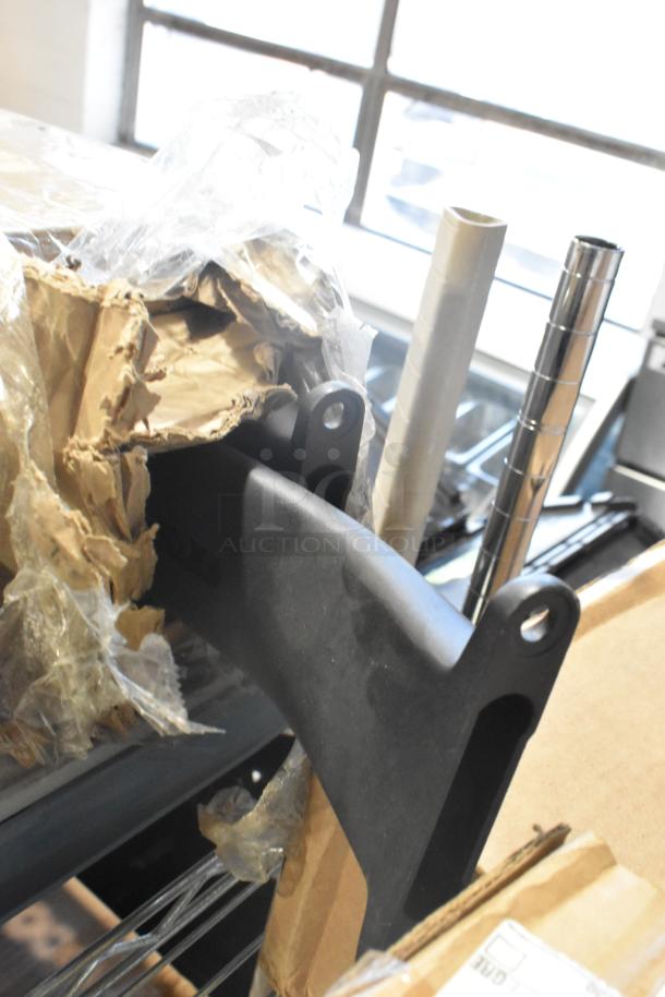 Brand new 19171186 Footrack Assy, partially unpacked, with protective wrapping and cardboard packaging visible.