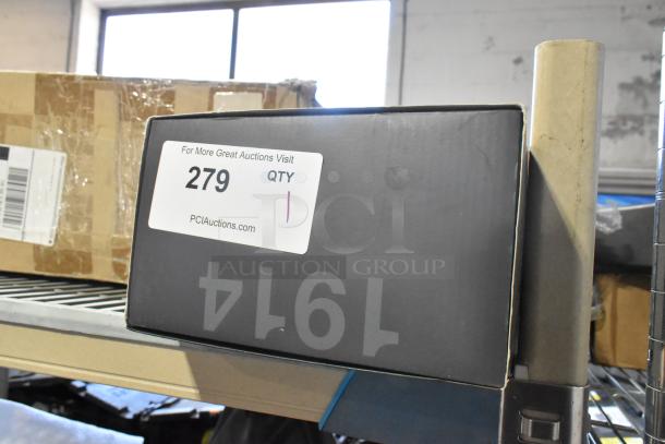 Brand new Noco Boost Pro jumper in box, labeled "279" for auction. Ideal for starting dead batteries.