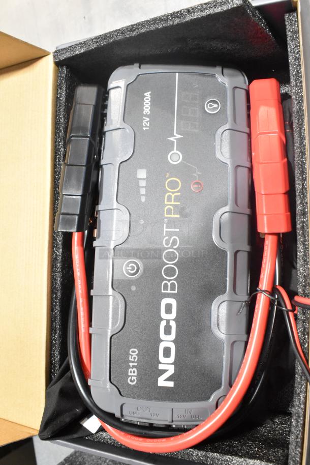 Brand new Noco Boost Pro GB150 jumper, 12V 3000A, with black and red cables in original packaging.