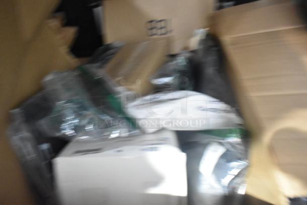 Blurry image of various packaged items in a box, including brand new car mats and a GM 84370635 floor liner.
