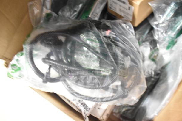 Brand new lot with car mats and GM 84370635 floor liner, wrapped in packaging, shows labels and product tags.