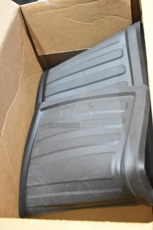 New GM 84162521 third row all-weather rubber floor mat, black, in box. Features durable grooves for traction.