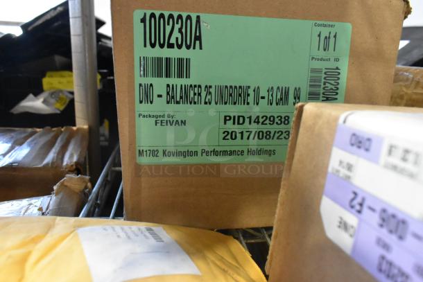 Box with label "100230A" containing Dino Balancer and GM 23473653 TPMS Valve Stem Caps. Packaged by Feivan. Item is new.