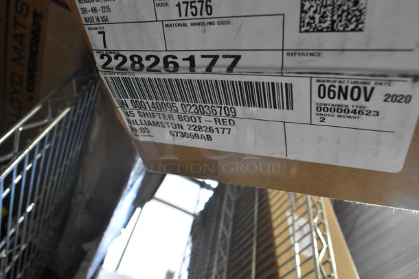 Box labeled "22826177 Shifter Boot - Red" with part number, dated Nov 6, 2020, on warehouse rack.