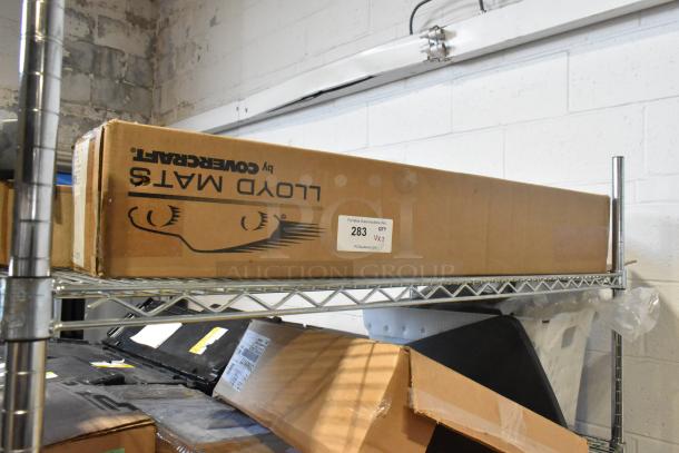 Brand new Corvette Coupe Cargo, GM 12499404 Rail Kit. Box labeled "Lloyd Mats by Corvette," on metal shelf.