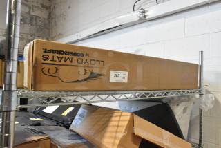 Brand new Corvette Coupe Cargo, GM 12499404 Rail Kit. Box labeled "Lloyd Mats by Corvette," on metal shelf.