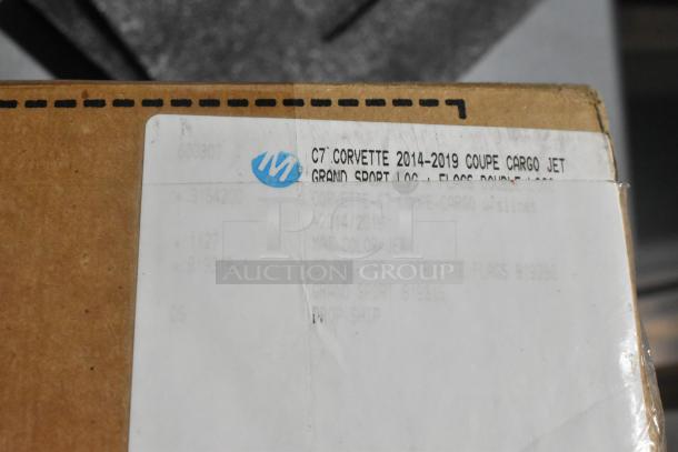 Brand new items including Corvette Coupe Cargo, GM 12499404 Rail Kit. Box label indicates C7 Corvette 2014-2019.