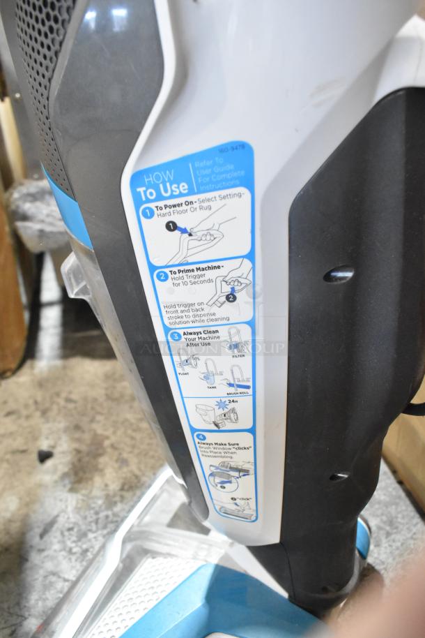 Bissell Multi Surface Brush Vacuum Cleaner with usage instructions label; 115 volts, 1 phase, good condition.