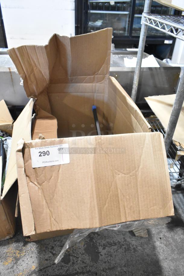 Brand new light fixture in an open cardboard box, labeled with "290 QTY" and "PCIAuctions.com."