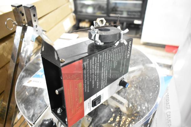 Brand new electric bud trimmer, 115 volts, 1 phase, scratch and dent condition. Features safety and operation notices.