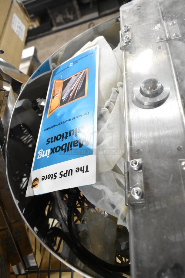 Brand new scratch and dent electric bud trimmer, 115 volts, 1 phase, visible metal components, includes cover and power cord.