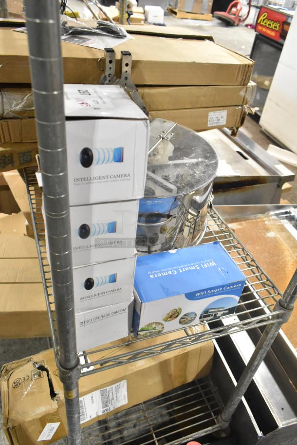 Brand new intelligent cloud storage cameras, scratch and dent lot, includes WiFi smart cameras. Boxes show minor wear.