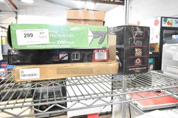 Four brand new scratch and dent items including a liquid transfer pump, car multimedia player, and faucet on a shelf, labeled with auction tag "299".