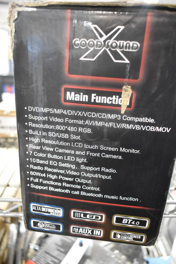 GoodSound car multimedia player box showing compatible formats, features like Bluetooth, LCD touchscreen, and remote control.