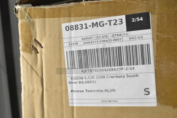 Cardboard box with shipping label showing item code 08831-MG-T23. Marked "Made in China." Box has visible tape and staple marks.