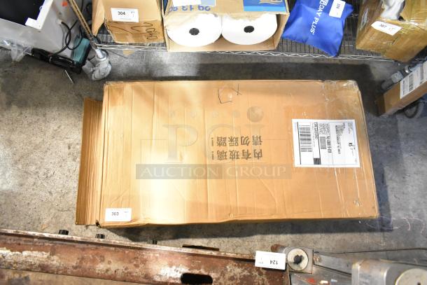 Brown cardboard box labeled with shipping information, slight dents visible. Item noted as "Brand New Scratch and Dent."