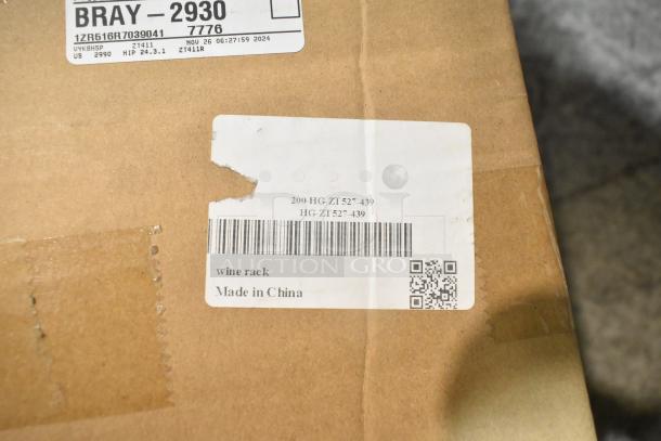 Cardboard box with visible label for 200-HG-ZT527-439 wine rack, marked "Made in China." Item is brand new, scratch and dent.